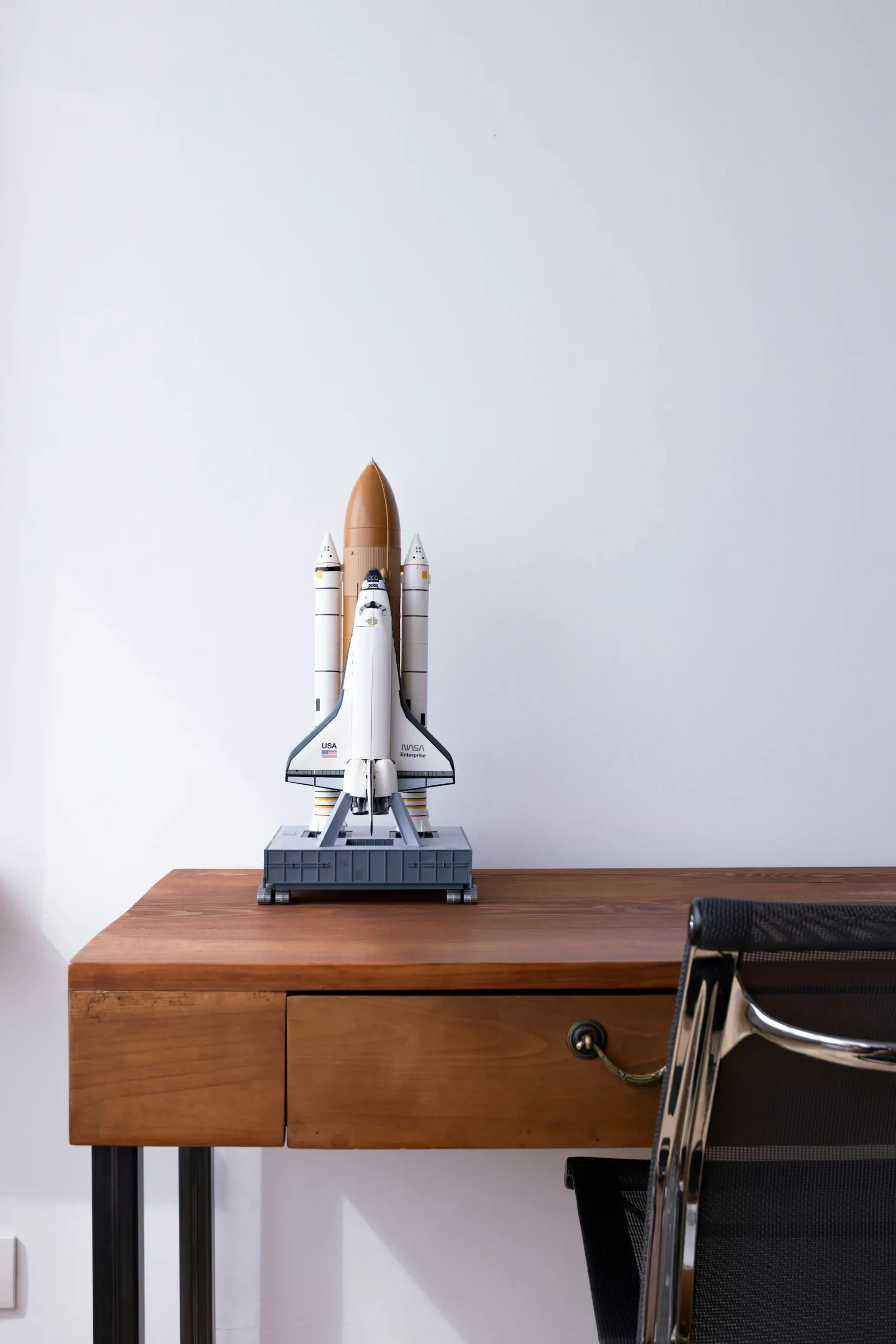 Toy rocket on desk